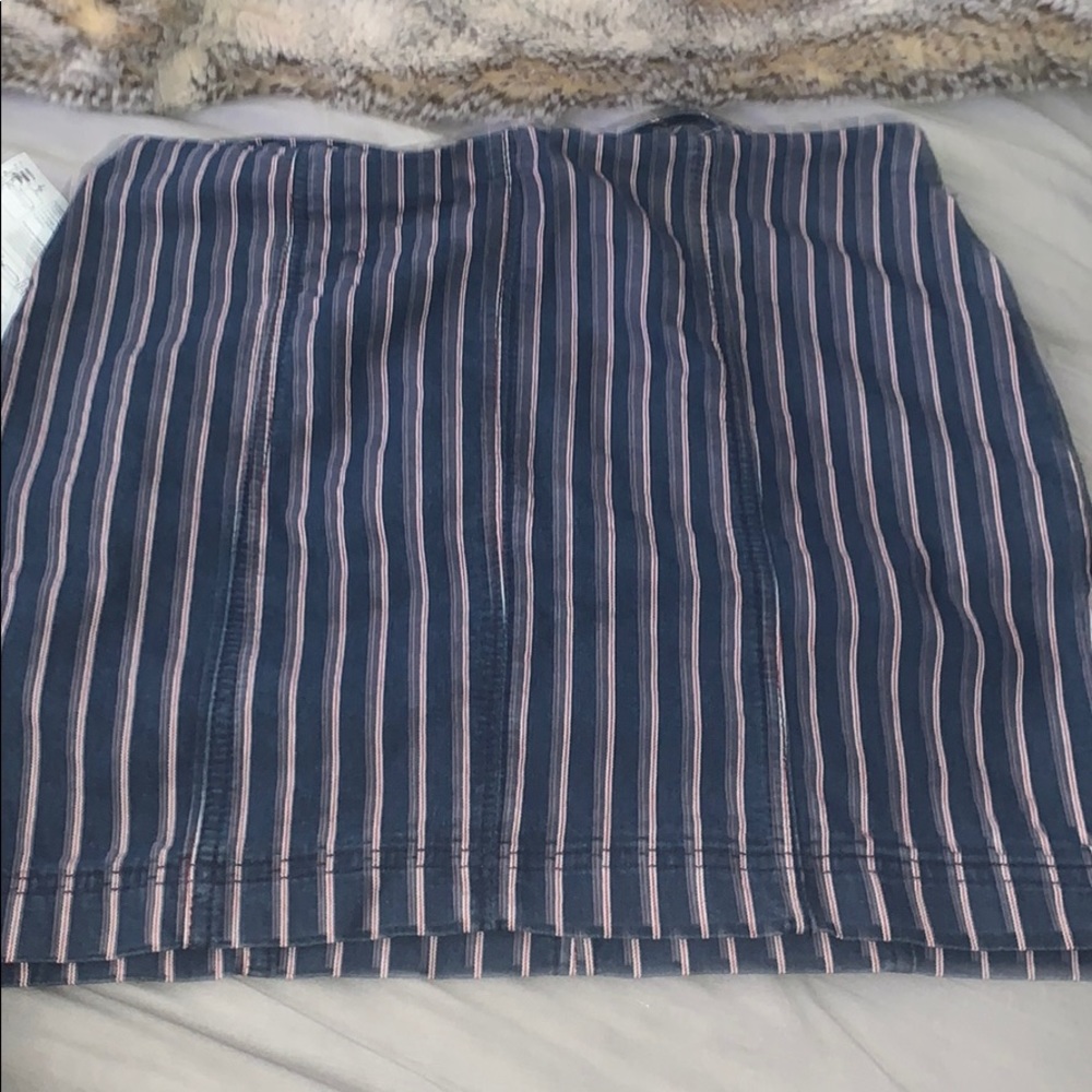 Blue denim skirt with red and white lines